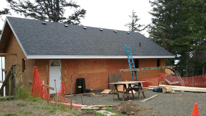 roof with shingles nailed on