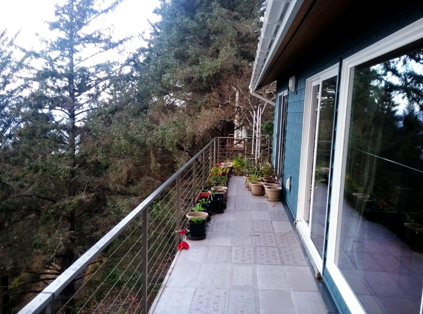 ocean facing five foot wide deck outside kitchen