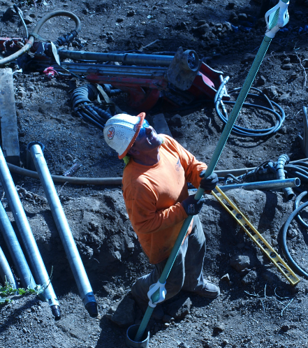 Steel rods go down into bore holes before adding concrete